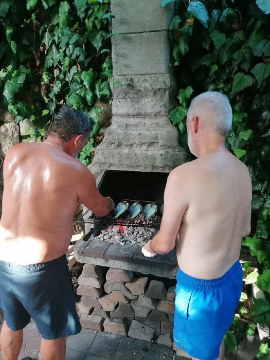 Grilling fish in the garden