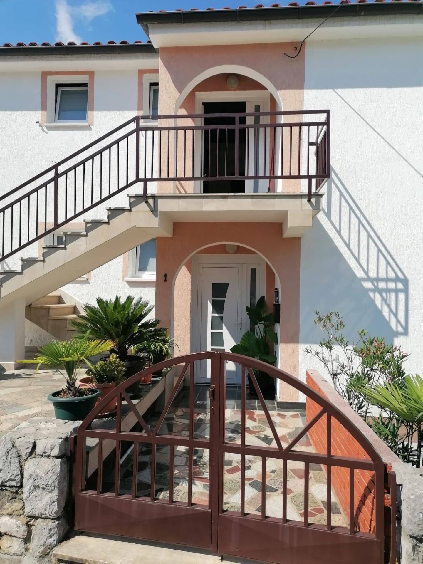 Gate is open, enter and ring the bell